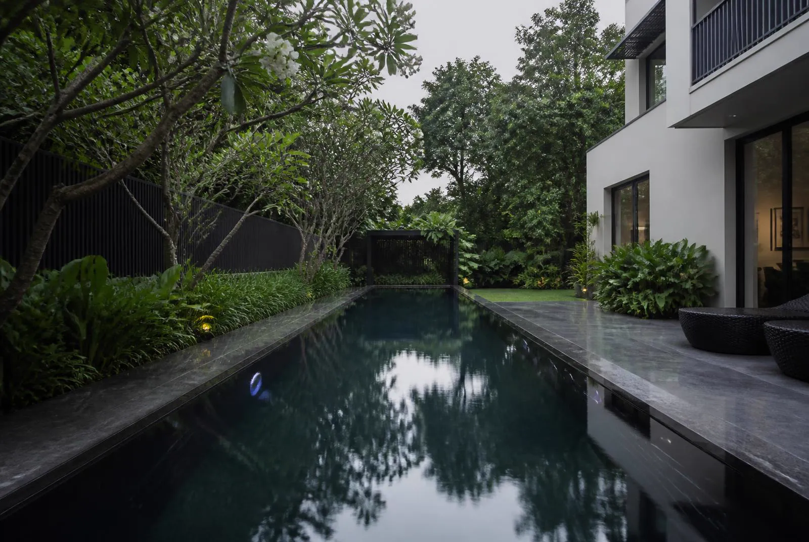 Reinforced membrane liner lap pool at a Bengaluru bungalow