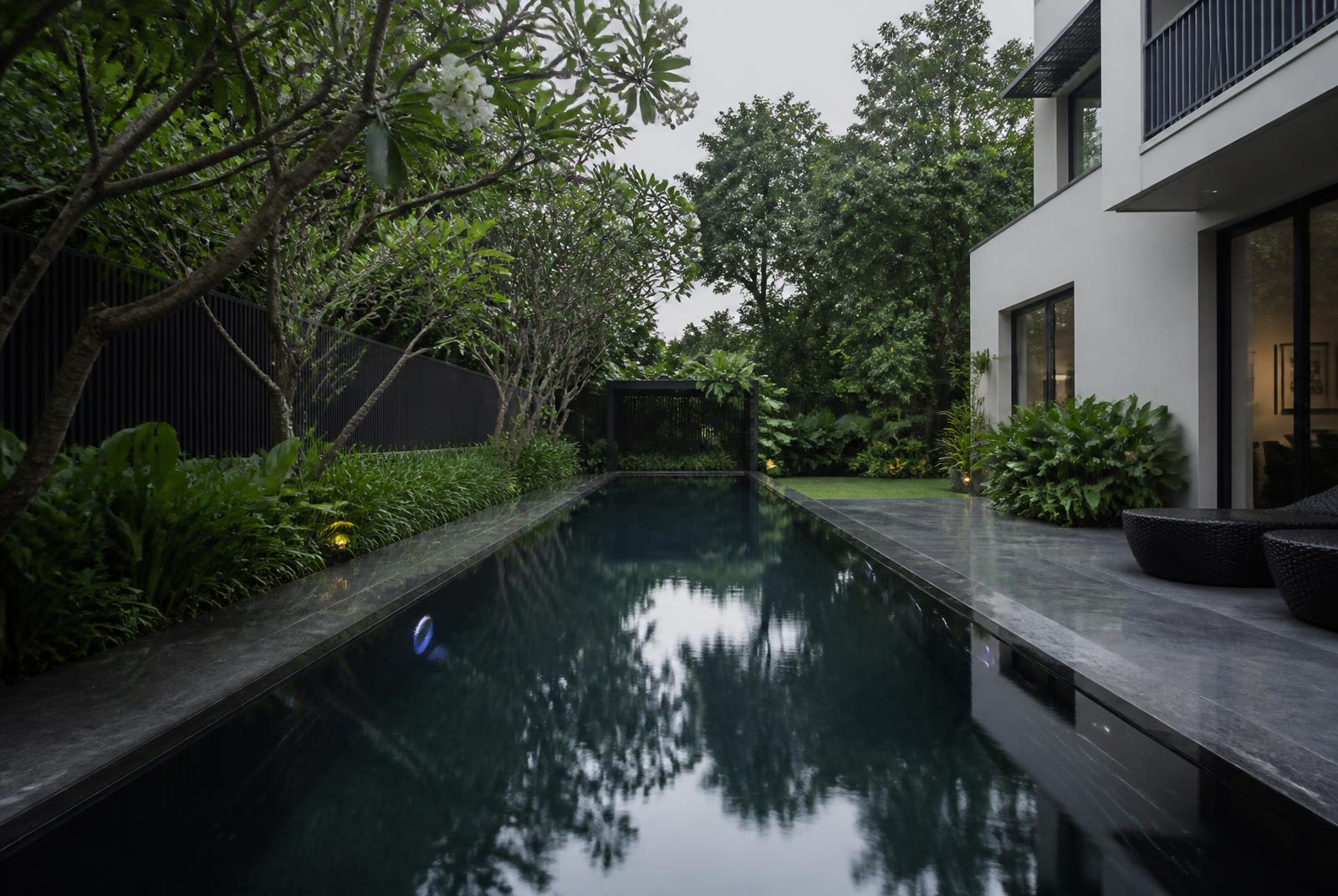 Reinforced membrane liner lap pool at a Bengaluru bungalow